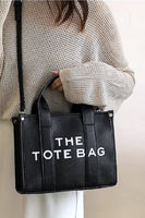 
              The Tote Bag in Black
            