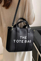 
              The Tote Bag in Black
            