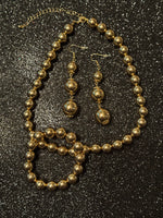 
              Essential Gold Bead Necklace Set
            