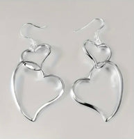 
              Double Heart Dangle Earrings
            