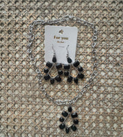 
              Black Crystal Earrings or Necklace
            