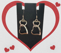 
              Double Heart Dangle Earrings
            