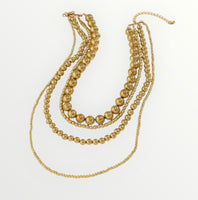 
              Gold Bead Necklace Set
            