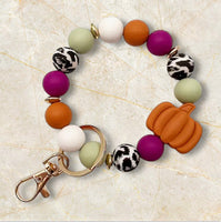 
              Pumpkin Bracelet Keychain-Rust
            