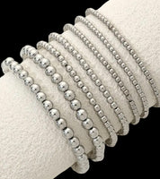 
              Silver Bead Stretch Bracelet Stack
            