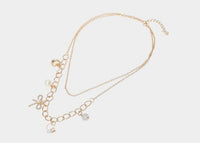 
              Bow Pearl Charm Double Layered Necklaces
            