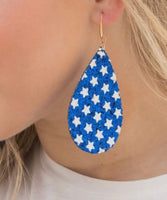 
              Star Spangled and Sparkling earrings, blue glitter
            