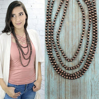 
              Western Pearl Layered Necklace
            